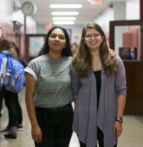 Mira Lee Prabhu (left) and Julia Appel (right) smile for the camera. The two seniors were recently granted the right to vote on the Human Relations Commission.
