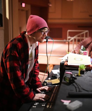 Henry Heyden, sophomore, working the soundboard. Heyden has been a part of tech since 7th grade, and has worked on all different types of productions.