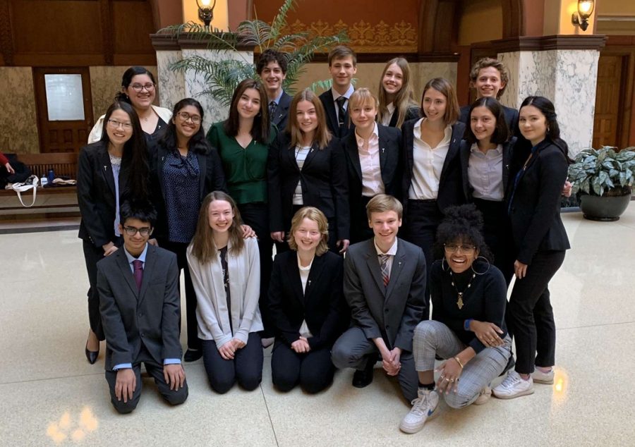 Shorewood+Mock+Trial+poses+at+regionals+on+February+8.+The+Red%0ATeam+will+move+on+to+state+in+March.