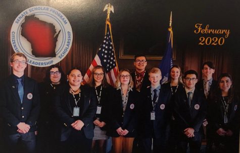 Olivia Johnson (fifth from the left), junior, poses with her fellow Senate Scholars to commemorate the week.