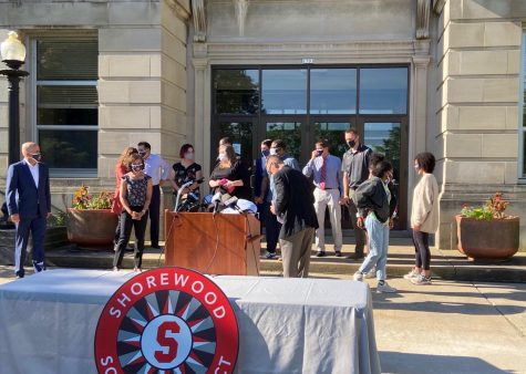 Students and administration stand on the steps of the high school getting ready for the press conference on June 8. In the press conference, superintendent Dr. Bryan Davis called on the Milwaukee District Attorney to elevate Stephanie Rapkin's charges to a hate crime