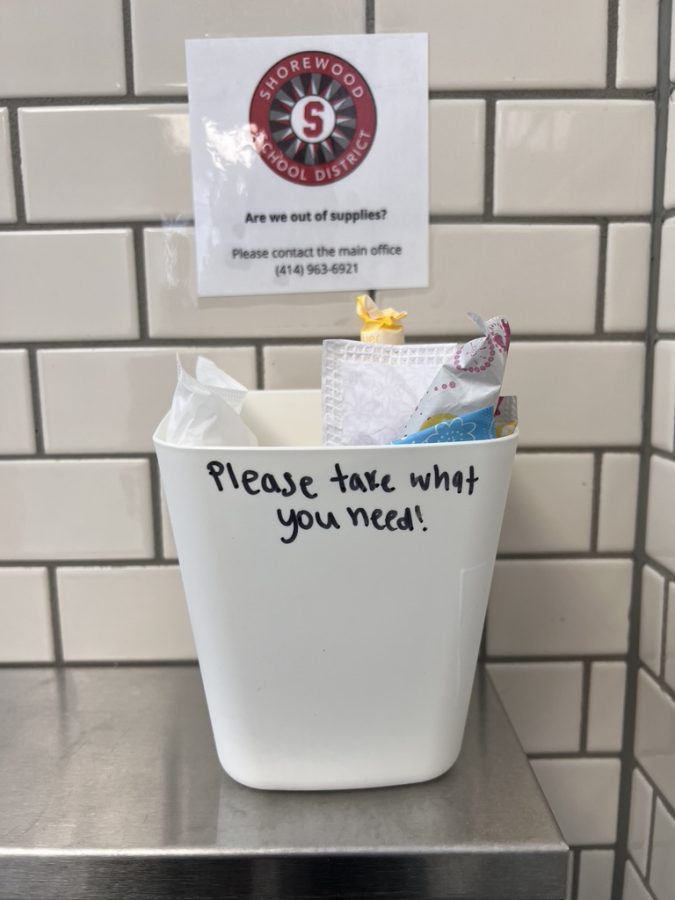 Containers full of free menstrual products, like the one shown above, have been placed in bathrooms around SHS. 