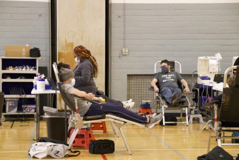 Donors give blood during the third blood drive of the year, held on March 2.