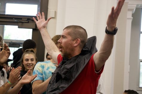 Tim Kenney, SHS principle, celebrates his completed buzz cut.
