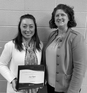 Sarah Kopplin (left) receiving her certificate from Dr. Jill Underly (right), WI Superintendent. 
